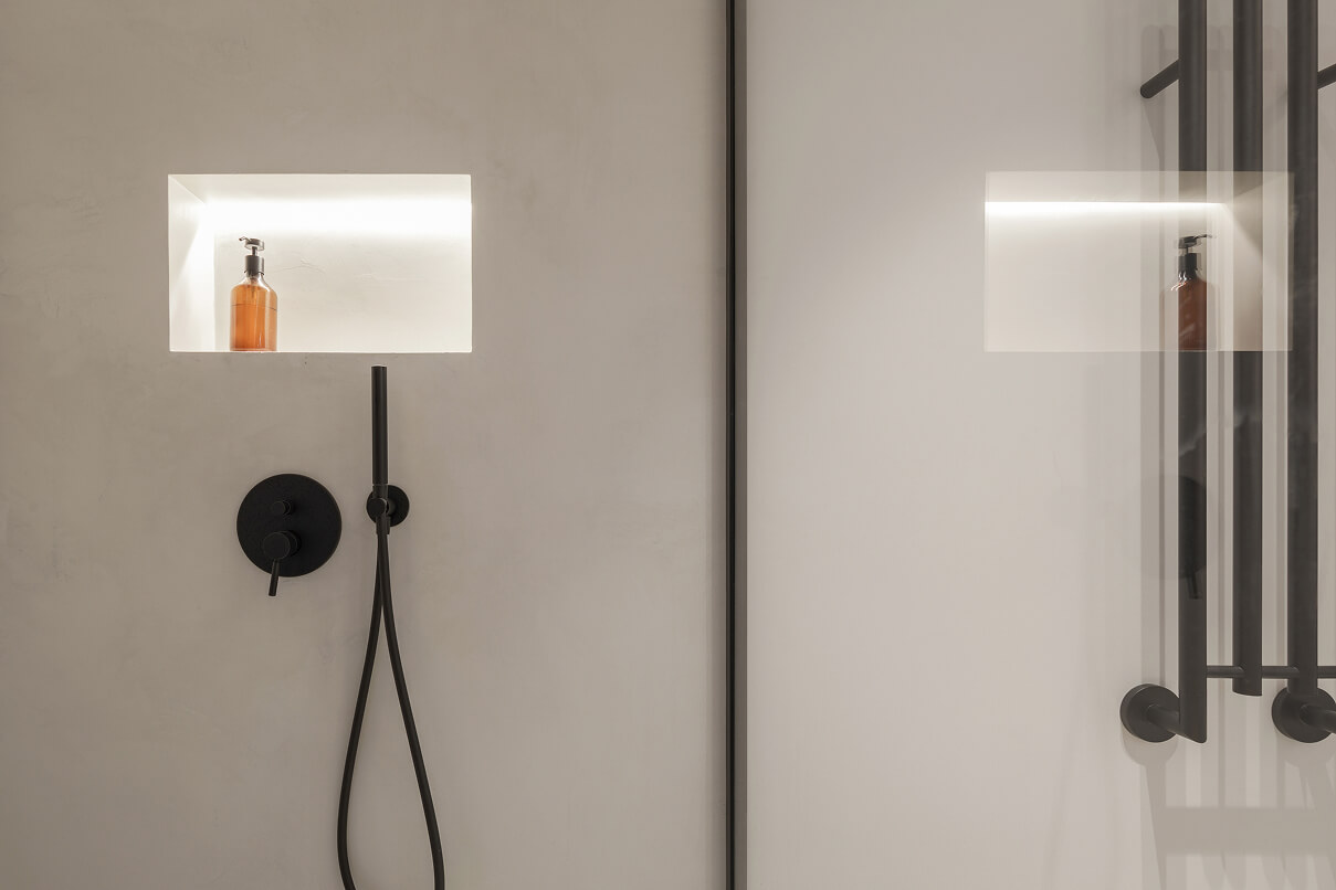 Microcement bathroom with seamless walls and integrated shower